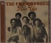 "The Commodores" und "Rise Up" in brauner Schrift, darunter ein Schwarz-Weiß-Bild von sechs lächelnden Männern., CD