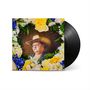 Das Bild zeigt ein Albumcover mit einem Mann im Cowboyhut, umrahmt von gelben und blauen Blumen. Rechts eine schwarze Schallplatte., LP