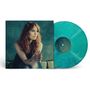 Text: "Alicia Witt Between Heaven and Earth". Frau mit rotem Haar, seitlich sitzend, auf einem Plattencover. Mintgrüne Vinylplatte., 2 LPs