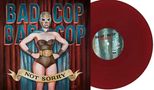 Text: "BAD COP BAD COP" oben, "NOT SORRY" auf einem Banner. Illustration: Frau im Wrestler-Outfit mit Masken. Ganz in Farbe., LP