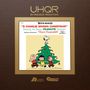 "A Charlie Brown Christmas" von Vince Guaraldi. Peanuts-Charaktere um einen Weihnachtsbaum mit Snoopy oben drauf.