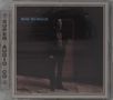 Text: "BOZ SCAGGS", "SUPER AUDIO CD". Dunkles Foto eines Mannes in einem Anzug, teilweise im Schatten., Super Audio CD