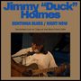 Text: "Jimmy 'Duck' Holmes - Bentonia Blues / Right Now. Recorded Live on Tape at the Blue Front Cafe."    
Ein Musiker spielt Gitarre und singt.