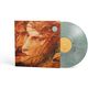 "Loreena McKennitt: To Drive the Cold Winter Away" steht auf einem Albumcover mit Gemälde von zwei Gesichtern. Vinyl in Marmormuster., LP