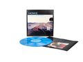 Text: "HOWE - CONFLUENCE". Ein blaues Vinyl, Albumcover mit Hand am Lenkrad, Wüstenlandschaft im Hintergrund., LP