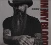 Der Text lautet "CODY JINKS" und "IN MY BLOOD". Ein Mann mit Vollbart und Hut, tätowierte Arme, ernstes Gesicht., CD