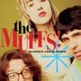 "The Muffs! Blonder and Blonder" in großen Buchstaben, drei Personen nah beieinander, ernst und direkt in die Kamera blickend., LP