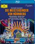 RICHARD WAGNER: DIE MEISTERSINGER VON NÜRNBERG. Szenenbild einer bunten Opernaufführung mit vielen Darstellern., Blu-ray Disc
