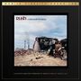 "Rush: A Farewell to Kings". Darstellung einer Ruine mit einem thronenden König, im Hintergrund Industriegebäude., 2 LPs