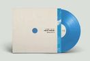 Auf der Hülle steht "A Brief Inquiry Into The Top Trends". Eine blaue Vinyl-Schallplatte ist teilweise sichtbar., LP