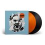 Text: "MASSEN DEFEKT" auf einem orangen Kreis. Collage eines schreienden Gesichts auf blauem Hintergrund. Schwarze und orangefarbene Schallplatten., 2 LPs