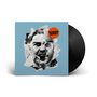 Text "MASSEN DEFEKT" in einer orangefarbenen Blase auf zerrissenem Porträt eines schreienden Mannes, Vinyl im Hintergrund., LP