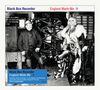 "Black Box Recorder", "England Made Me". Links: Bergarbeiter, rechts: Person in Glam-Rock-Outfit vor Bergwerk.