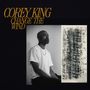 Oben steht "COREY KING CHANGE THE WIND". Links ein Mann in Schwarz-Weiß, rechts abstrakte Kunst in Schwarz., LP