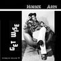 „Horace Andy – Get Wise“. Schwarz-Weiß-Foto: Mann in Hut und gemustertem Hemd sitzt lässig in einem Sessel., LP