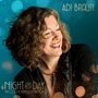 Texte: "ADI BRAUN", "NIGHT AND DAY", "THE COLE PORTER SONGBOOK". Frau mit lockigem Haar lächelt vor blauem Hintergrund., CD