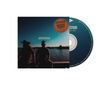 Der Text „WATERTOWN“ steht in der Mitte. Silhouetten zweier Personen am Wasserrand mit blauem Himmel., CD