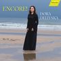 Text: "ENCORE!", "DORA DELIYSKA", "hänssler CLASSIC". Eine Frau in langem schwarzem Kleid steht barfuß am Strand.