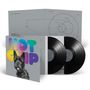 Bunte Schrift "HOT CHIP", darunter ein Bild eines schwarzen Hundes mit herausgestreckter Zunge. Zwei Vinyl-Schallplatten., 2 LPs