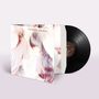 „My bloody valentine“ steht auf einem Albumcover, daneben eine schwarze Vinyl-Schallplatte.
