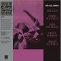 Texte: "THE CATS," "TOMMY FLANAGAN," "JOHN COLTRANE," "KENNY BURRELL," "IDREES SULIEMAN." Illustration: Zwei Katzen in violetten Tönen., LP