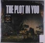 „THE PLOT IN YOU“ Schriftzug oben, dekorative Pflanzen und Steine im Hintergrund, Vinyl-Aufkleber links., LP