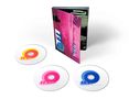 "R.E.M. REVEAL" auf drei CDs, farbig und nebeneinander. Pinker CD-Hüllenrand mit stilisierter Gestaltung., 2 CDs und 1 Blu-ray Disc