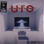 "UFO" und "THE MONKEY PUZZLE" auf einem Cover mit einem Raumschiff in einem futuristischen Raum.