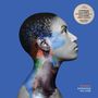 „Plays at 45 RPM“, „Dominique Fils-Aimé’s Internationally Acclaimed Debut Album“, „Nameless“. Profilansicht einer Frau mit bunten Farben., LP