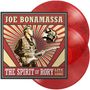 „Joe Bonamassa“, „The Spirit of Rory“, „Live from Cork“. Illustration eines Gitarristen, rot-gelber Hintergrund, rote Vinylplatten.