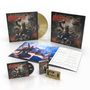 Cover mit "Gods of Thunder" und "Saxon". Enthält LP, CD, Kassette, Notenblatt und Konzertfoto. Illustration mit Krieger., 1 LP, 1 CD und 1 MC