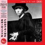 Text: "BRIGITTE FONTAINE", "comme à la radio", "ON AIR". Schwarz-Weiß-Bild einer Person mit Hut im Vintage-Stil., CD