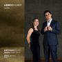 Text: "LIEBESZAUBER, LIEDER, DUO CHIAROSCURO, PIERRE-YVES CRAS, BARYTON, ANNA GIORGI, PIANO." Zwei elegant gekleidete Personen., CD