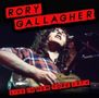 "Rory Gallagher", "Live in New York 1974" in roten Balken. Mann spielt Gitarre und trägt kariertes Hemd., CD