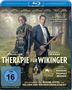 Blu-ray-Cover: "Therapie für Wikinger", zwei Männer im Wald mit Musikinstrumenten, Hund im Vordergrund., Blu-ray Disc
