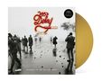 Logo "Jan Delay" in Rot und Gelb. "searching for the jan soul rebels" unten. Menschen laufen durch Rauch, gelbe Vinyl-Schallplatte., LP