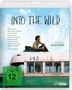 "INTO THE WILD" steht groß am Himmel über einem alten Bus. Ein Mann sitzt oben. FSK 12 ist unten links auf grünem Kreis., Blu-ray Disc