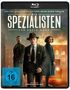 "Die Spezialisten: Der erste Mord" Blu-ray Hülle. Drei Personen in Anzügen vor brennendem Gebäude. FSK 16.
