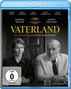 "Vaterland" in großen Buchstaben, darunter: "Ein Film von Oscar-Gewinner Paweł Pawlikowski". Zwei Personen sitzen an einem Tisch. FSK 0.