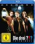 "DIE DREI ??? Toteninsel" zeigt drei Jungen, umgeben von Dunkelheit, einer hält eine Laterne. FSK 6 Logo unten links., Blu-ray Disc
