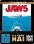 "Jaws", "Der weiße Hai", "4K Ultra HD + Blu-ray", "FSK 16". Illustration eines Hais unter einem schwimmenden Menschen., 1 Ultra HD Blu-ray und 2 Blu-ray Discs