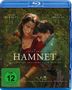 Text: "JESSIE BUCKLEY", "PAUL MESCAL", "HAMNET", "FSK ab 12 freigegeben". Zwei Personen sitzen eng umgeben von Pflanzen., Blu-ray Disc