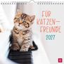 Text: "FÜR KATZENFREUNDE 2027". Ein süßes Kätzchen sitzt auf einer Klaviertastatur. Oben eine Spiralbindung., Kalender