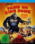 "Panik um King Kong," auffällig roter Text über einem großen Gorilla mit Cowboys und Pferden auf einem gelben Hintergrund.