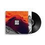 Text: "Musa Dagh." 
Vinylhülle mit abstraktem, rot-orangefarbenen Design und schwarzer Schallplatte., LP