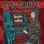"City Saints" und "Sods & Odds" sind die Haupttexte. Eine Illustration zeigt eine Person mit blauer Frisur neben einem Automaten., 2 LPs