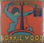 Text: "RONNIE WOOD" und "LIVE AT ELECTRIC LADYLAND". Illustration zeigt eine Person mit Gitarre in kräftigen Farben., LP