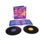 Text: "Works Live". Eine Schallplatte, ein Cover mit leuchtenden Musikern und ein Booklet mit Texten., 2 LPs