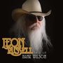 Text: "Leon Russell Best of Hank Wilson". Person mit weißem Bart, Sonnenbrille und Cowboyhut auf schwarzem Hintergrund.