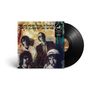 Text: "Traveling Wilburys". Abgebildet sind fünf Männer in einer Collage. Rechts ist eine Schallplatte zu sehen., LP